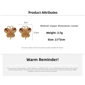 Detailed size chart of gold butterfly earrings with purple crystals and dimensions