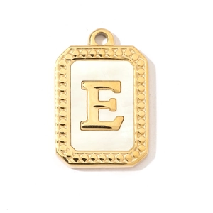 Macro detail of a gold rectangular letter E pendant with white mother-of-pearl inlay