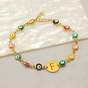 Golden titanium steel Evil Eye bracelet featuring colorful pendants and F letter charm