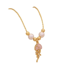 Golden necklace with pink jellyfish pendant featuring pearls and sparkling rhinestones