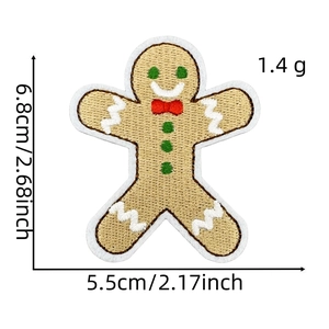 Detail of gingerbread man embroidery patch with dimensions 5.5x6.8cm and festive texture