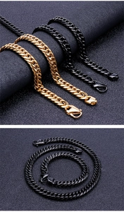 Close-up of gold and black stainless steel Cuban link necklaces with lobster clasps