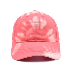 Detailed front view of pink and white tie-dye cotton baseball cap with curved brim