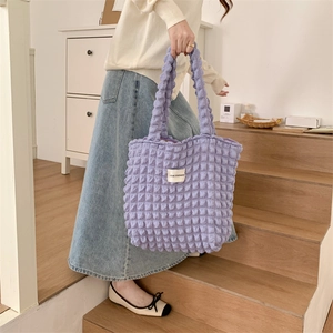 Detailed texture of purple bubble fabric tote bag with LOVE SOZAKKA woven label