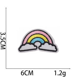 Detailed size view of rainbow embroidery patch with white clouds measuring 6cm by 3.5cm