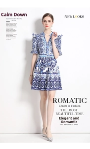 Detailed view of V-neck porcelain print dress with ruffle sleeves and retro patterns