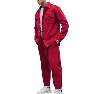 Detail of men's red faux suede jacket and pants set with visible velvet texture