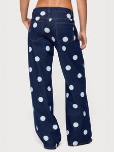 Women's dark blue wide-leg jeans with light blue polka dot print and back pockets