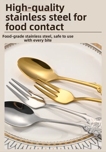 Detail of mirror-polished stainless steel rose spoons and forks on a ceramic plate