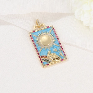 Golden sun and hand tarot pendant with blue enamel and colorful zircon accents