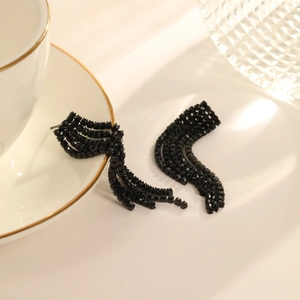 Elegant long black tassel earrings with sparkling rhinestones in a minimalist setting