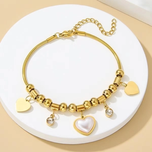 Gold-plated snake chain bracelet with white pearl heart charm and zircon pendants