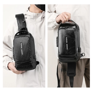 Detail of crossbody chest bag featuring anti-theft combination lock and USB charging port