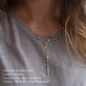 Double-layered 14K gold stainless steel Y-necklace with geometric pendant on model