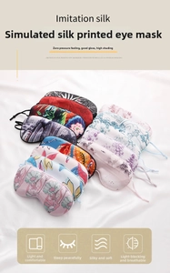 Detailed view of imitation silk sleep masks with floral patterns and adjustable straps