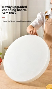 Close-up of a 5cm thick white round PE cutting board with durable non-slip surface texture