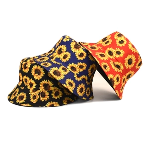Fashionable sunflower print bucket hats for sun protection in black, blue and red colors