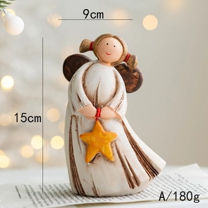 Detailed view of resin angel ornament with star showing dimensions 15cm x 9cm and 180g weight