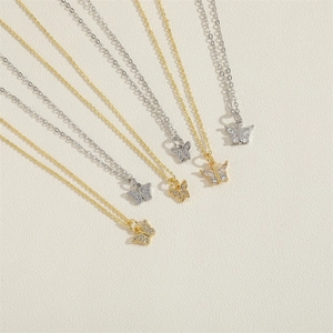 Sparkling butterfly zircon pendant necklace in gold and silver finish with cross chain