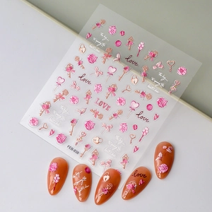 3D embossed nail art stickers with pink roses, love letters, and keys on orange nails