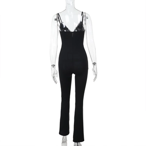 Detailed back view of sexy black lace-up jumpsuit with open back and flared legs