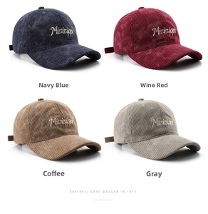 Detailed grid view of corduroy baseball caps in navy, burgundy, coffee, and grey colors