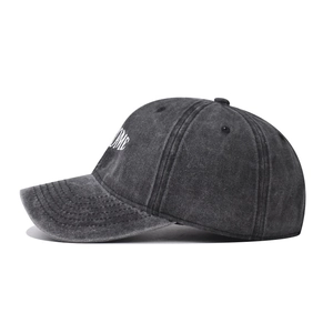 Dark grey washed cotton baseball cap with embroidered lettering and a vintage aesthetic