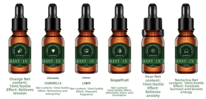 Set of six 10ml essential oils including citrus and floral scents in amber glass bottles