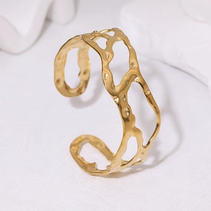 Luxury 18k gold plated titanium steel open bangle with irregular hammered texture