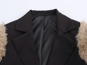 Detail of black notch lapel coat with premium brown faux fur shoulder patches