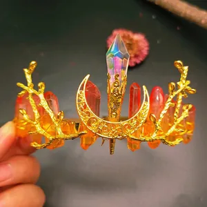 Detailed view of handmade golden branch crown with colorful natural crystal quartz columns