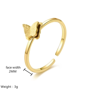 Detail view of 18K gold-plated butterfly ring showing 2mm face width and 3g weight
