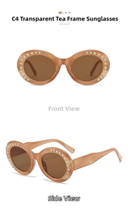 Close-up of tea-tinted oval sunglasses with sparkling diamond-encrusted frames for women