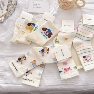 Cute Korean style mid-calf socks with cartoon puppy patterns in creamy white cotton
