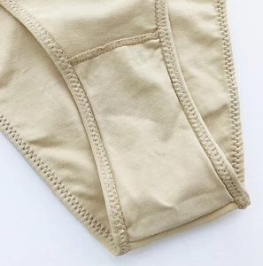 Close-up of skin-colored cotton underwear crotch area with reinforced double stitching