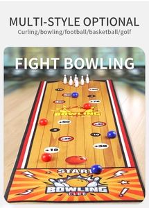 Detailed view of indoor bowling game mat with scoring zones and game accessories