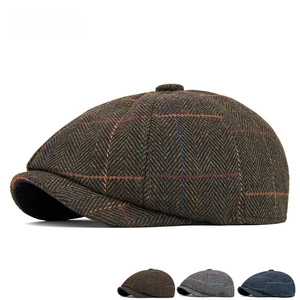 Vintage wool newsboy cap for men in brown herringbone pattern with textured finish