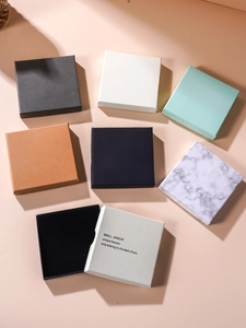 Various minimalist square jewelry gift boxes in multiple colors with foam inserts