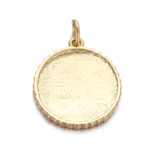 Detailed close-up of golden gear-edged round pendant tray for DIY jewelry making