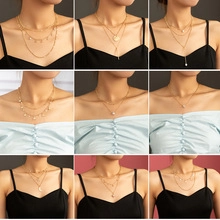 Collage of layered gold necklaces with pearl, star, and moon charms on model