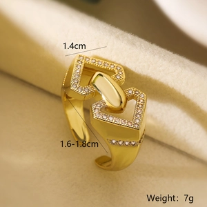 Macro view of gold-plated heart chain ring with cubic zirconia showing 1.4cm width detail