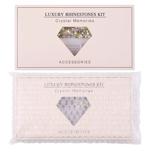 Detail view of Crystal Memories luxury nail rhinestone kit in elegant pink packaging box