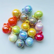 Detailed view of colorful 16mm iridescent star and rhinestone glass ball pendants
