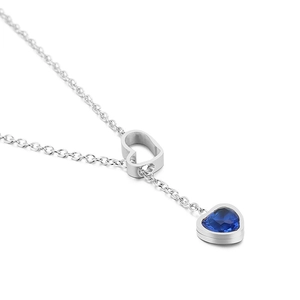 Minimalist silver Y-shaped necklace featuring hollow heart slider and blue gemstone pendant