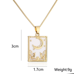 Detail shot of 18K gold plated celestial pendant necklace with size labels 3cm x 1.7cm