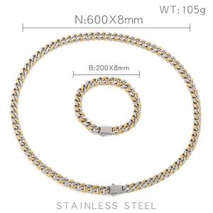 Vue détaillée des spécifications de l'ensemble collier et bracelet à mailles gourmette bicolores