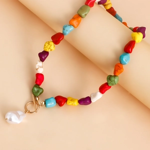 Handmade necklace with colorful natural stones and a baroque pearl pendant with OT clasp