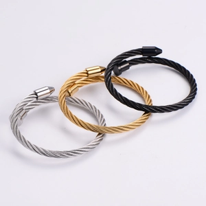 Three-piece twisted cable nail bangles in silver, gold, and black stainless steel colors