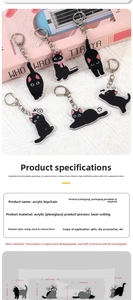 Detailed view of cartoon black cat acrylic keychains showing various cute poses and sizes
