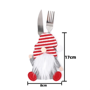 Christmas gnome cutlery holder with dimensions 17x8cm featuring red striped hat and beard